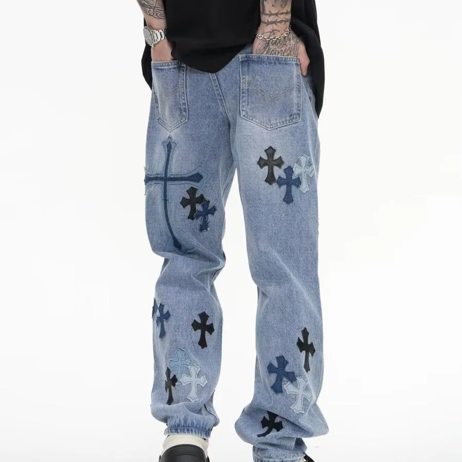 cross embroidered jeans